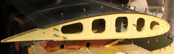 wingtip end of wing supported on box and pillow, with the end spar cleco'd in.